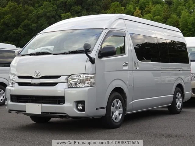 White Toyota Hiace — Van Rental for Group Travel